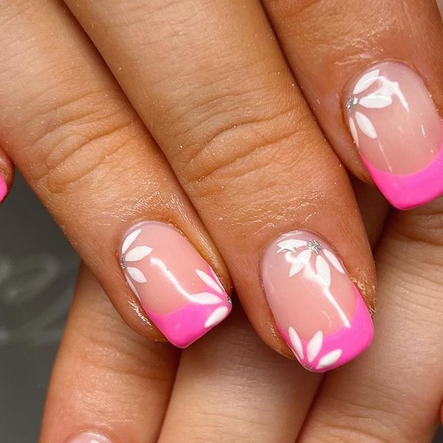 Playful Pink and Clear Nail Design with Elegant Floral Accents