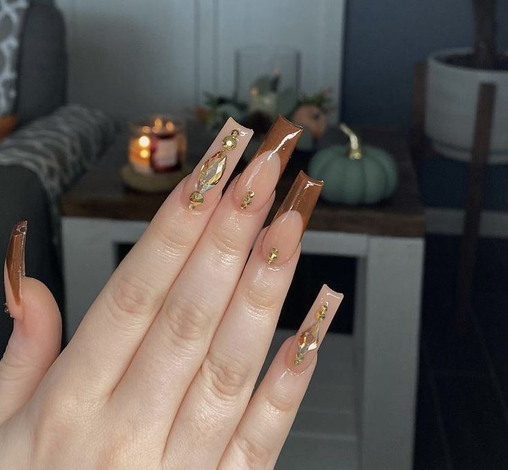 Chic Autumn-Inspired Long Nails with Warm Brown and Glam Accents