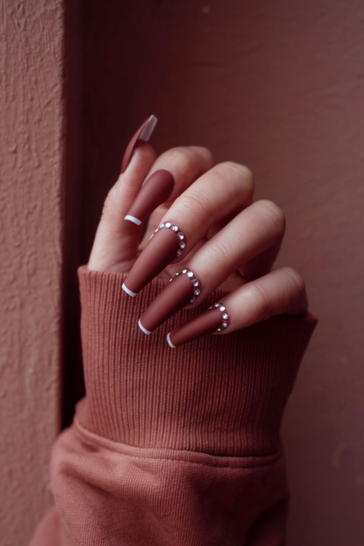 Sophisticated Almond-Shaped Matte Mahogany Nails with White Tips and Rhinestone Accents