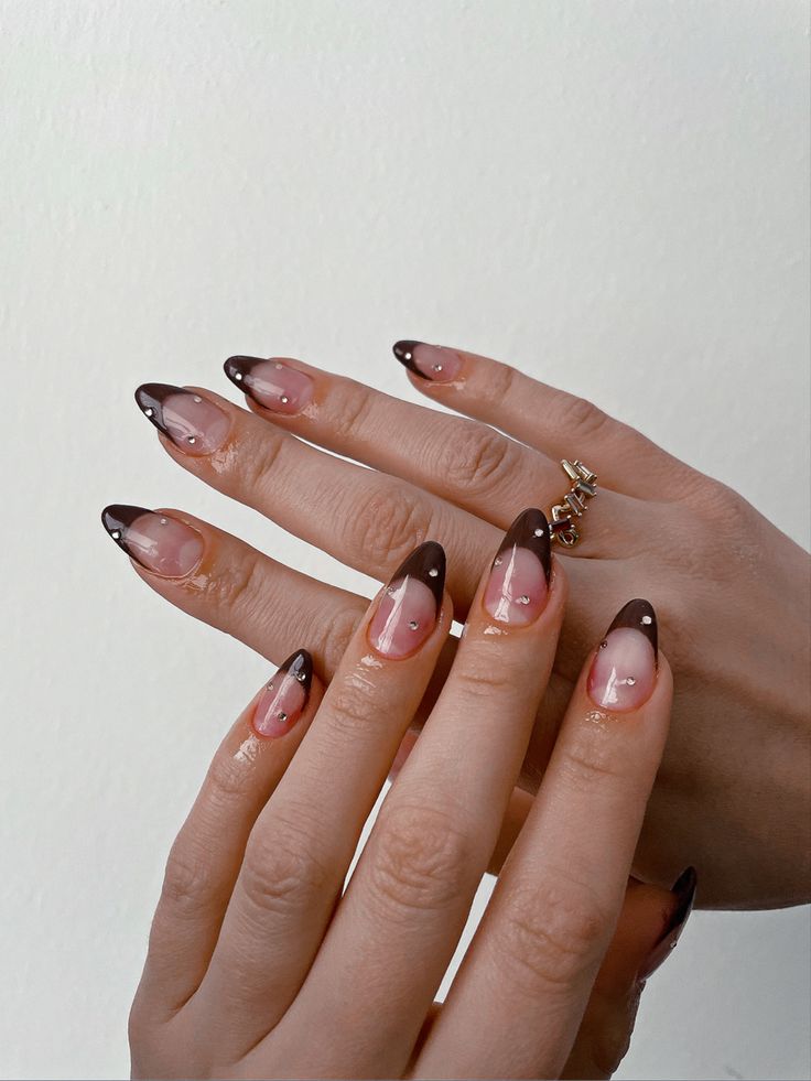 Chic Almond-Shaped Ombre Manicure with Chocolate Brown Tips and Elegant Accents