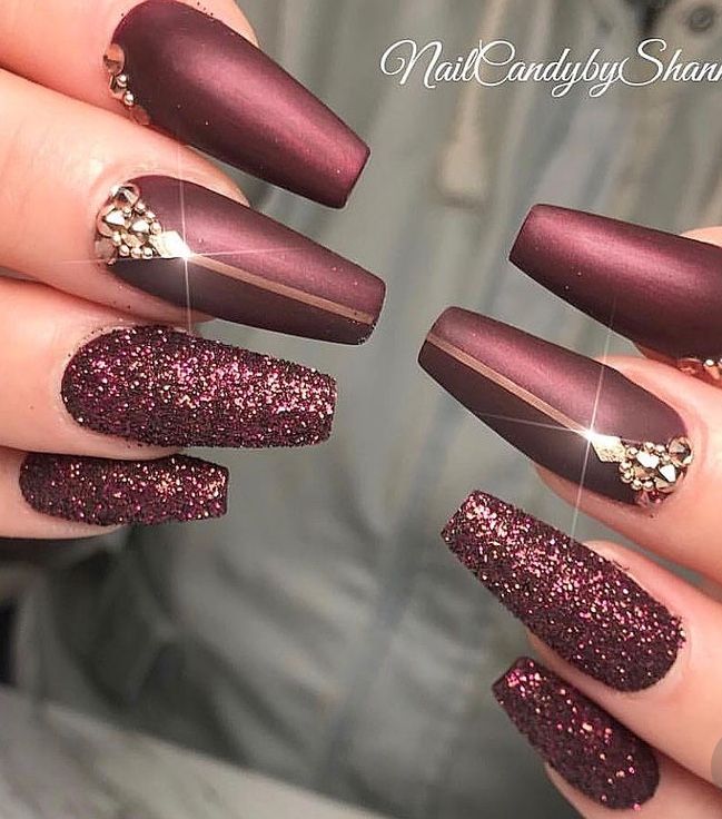 Elegant Burgundy Matte Nails with Sparkling Glitter Accents for Special Occasions.