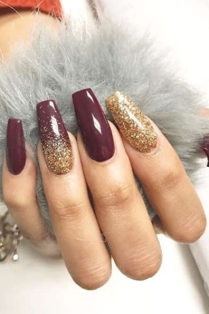 Elegant Burgundy and Gold Glitter Nail Design for a Glamorous Occasion.