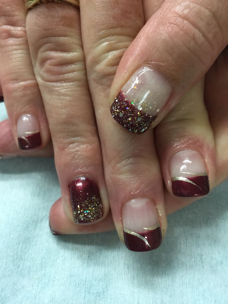 Sophisticated Burgundy Glitter Nail Design with Elegant Gold Accents