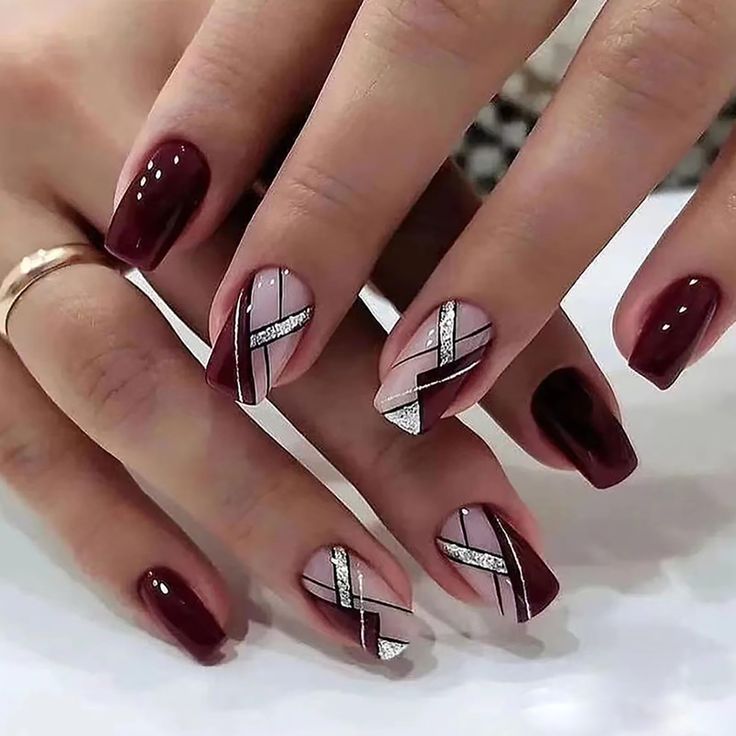 Elegant Burgundy and Pink Geometric Nail Design with Silver Accents