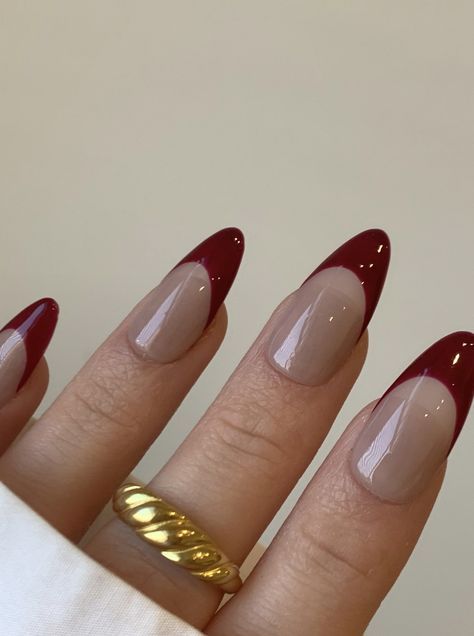 Sophisticated Modern French Tip Nail Design with Glossy Deep Burgundy and Soft Nude.