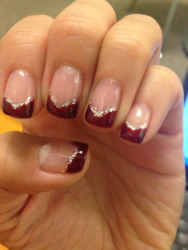 Sophisticated Deep Burgundy Nail Design with Silver Chevron Detailing