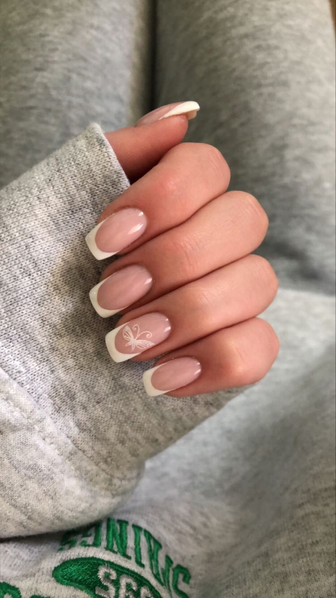 Elegant Twist on Classic French Manicure with Floral Accents