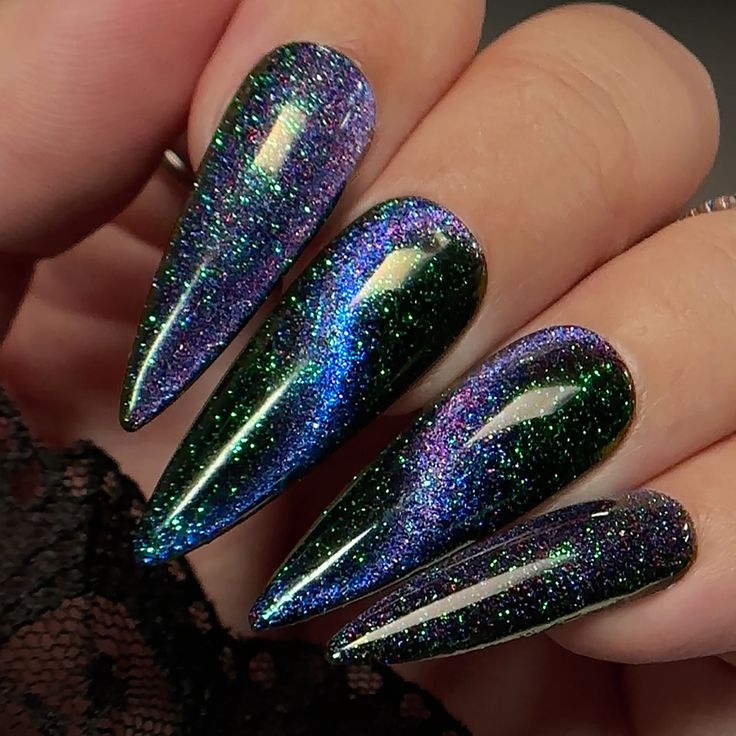 Mesmerizing Stiletto Gradient Nails in Deep Green and Shimmering Purple.