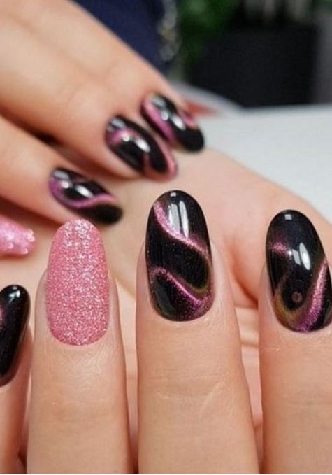 Elegant Black and Pink Glitter Nail Design with Artistic Metallic Swirls.