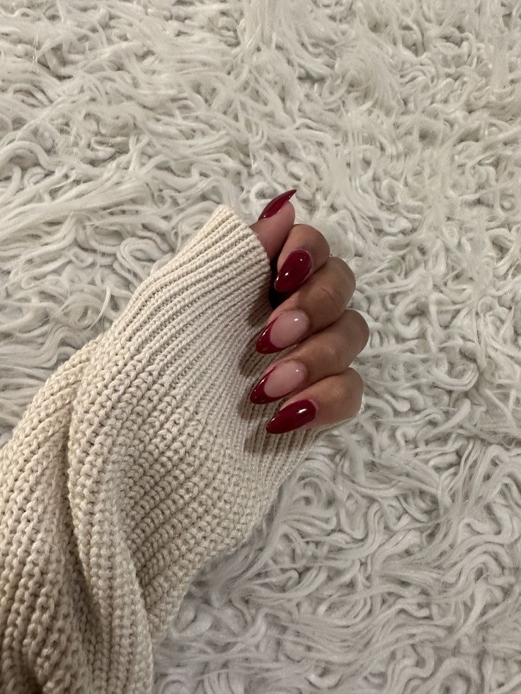 Sophisticated Burgundy and Nude Nail Design with Glossy and Matte Accents.