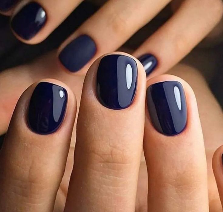 Sophisticated Dark Purple Nails: Chic Minimalist Design with Glossy Finish.