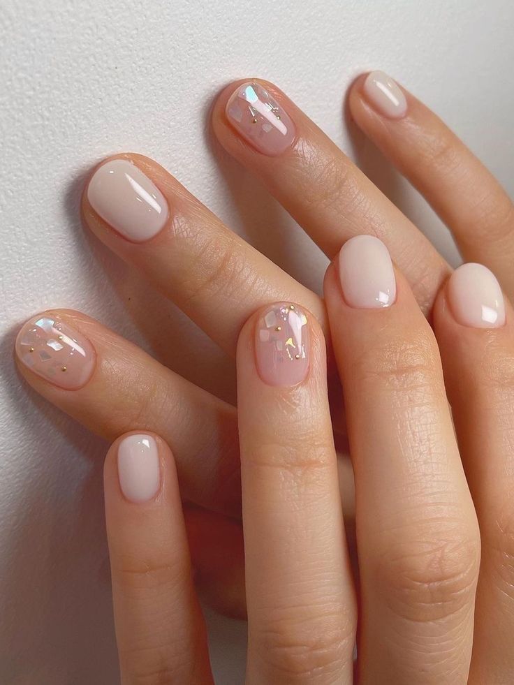 Elegant Nude Nail Design with Iridescent Geometric Accents for Versatile Style