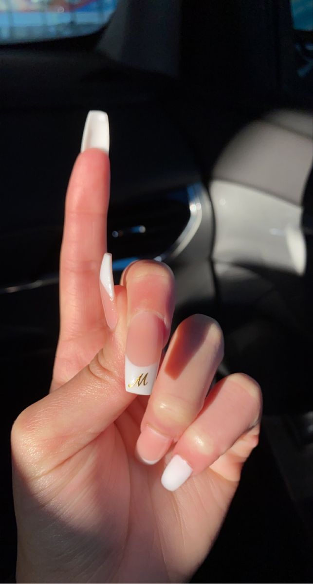 Chic French Tip Nails: Glossy White with Golden Accent for Sophisticated Elegance.