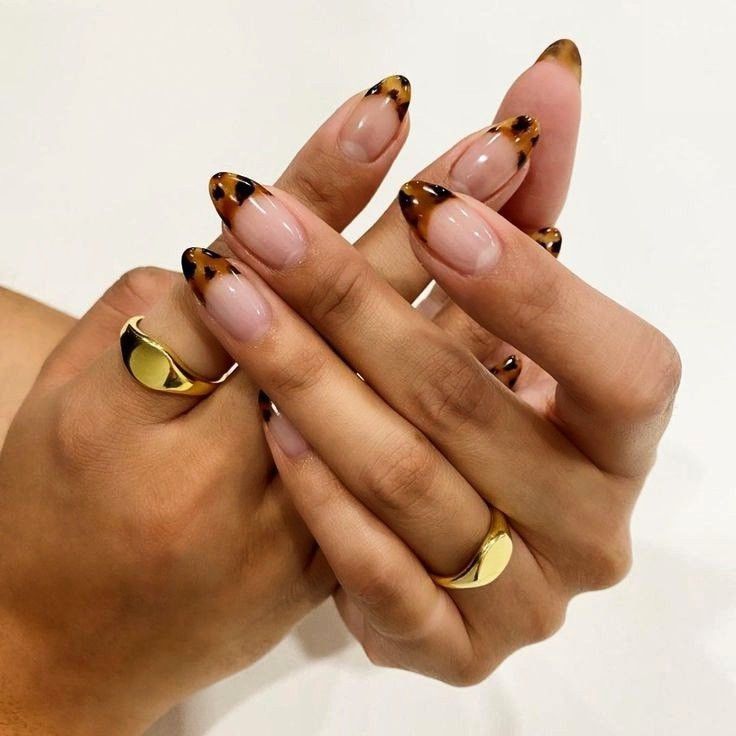 Chic Tortoiseshell Nail Design with Elegant Tips and Minimalist Gold Accents