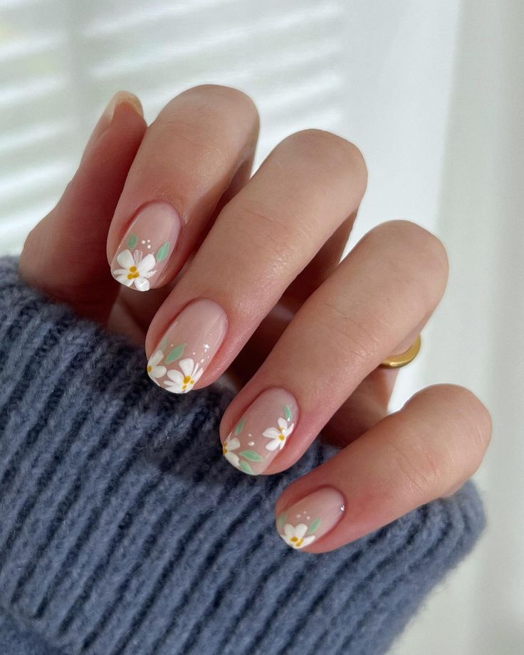 Charming Spring Floral Nail Design with Pastel Colors and Intricate Details.