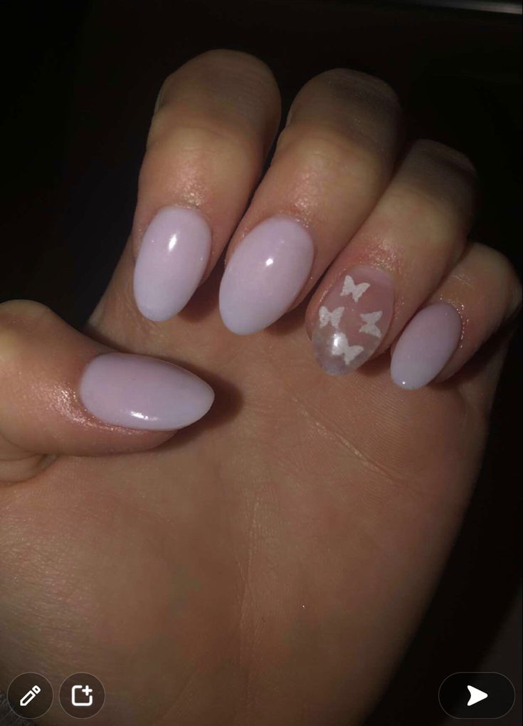 Elegant Lavender Ombre Nails with Whimsical Butterfly Accent