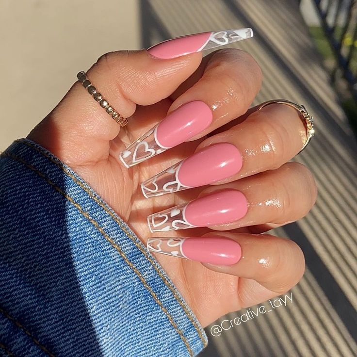 Chic Pink and Clear Acrylic Nails with Elegant Heart Design.