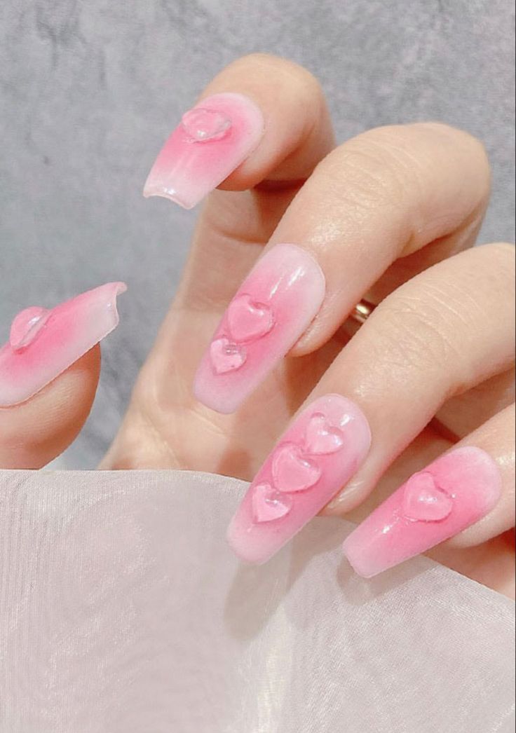 Romantic Gradient Nail Design with Charming Heart Accents