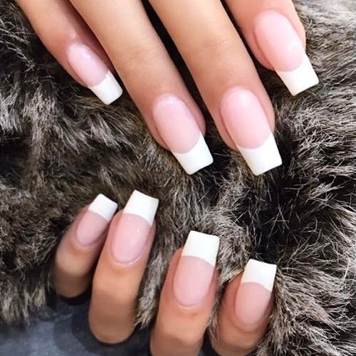 Elegant Modern Classic French Manicure with Crisp White Tips and Squared Shape.