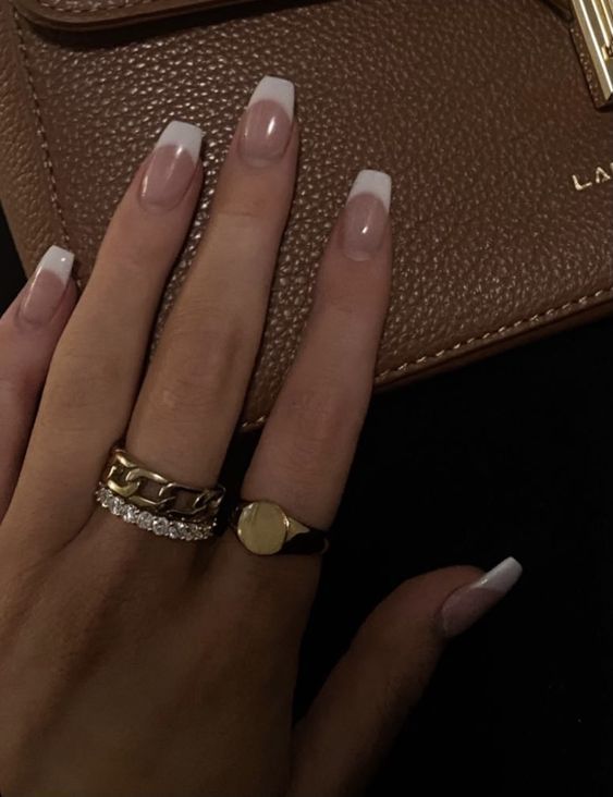 Sophisticated French Manicure: A Chic Elegance with Stylish Accessories