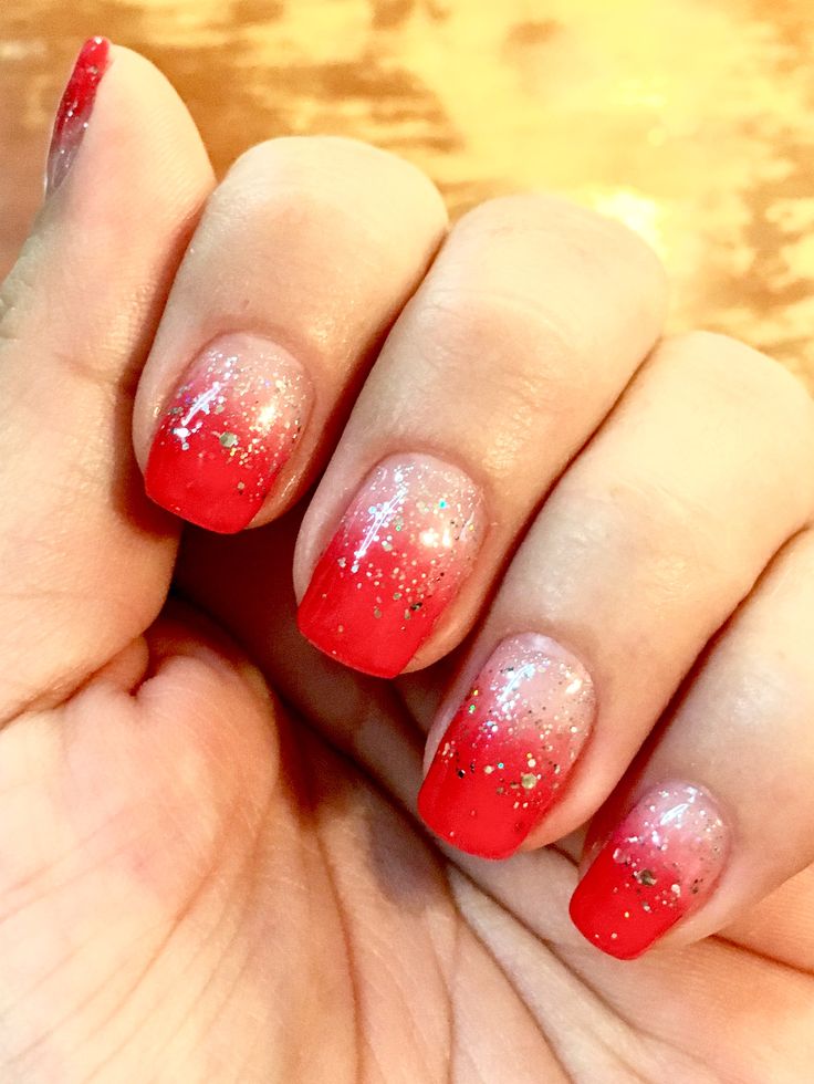 Chic Ombre Nail Design: Deep Red to Soft Pink with Glitter Accents