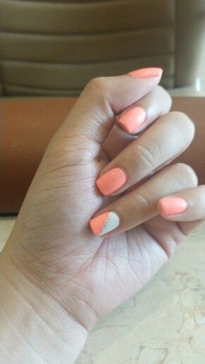 Chic Peachy Nail Design with Coral Hue and Elegant White Accent