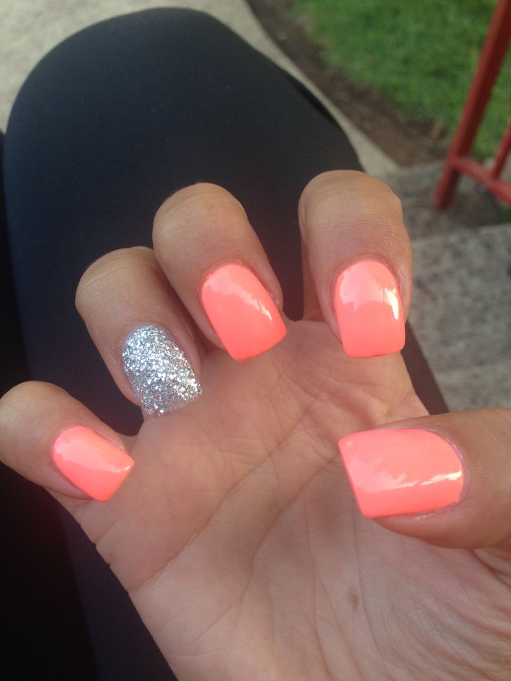 Bold Neon Pink Nails with Shimmering Silver Accent for a Glamorous Manicure.