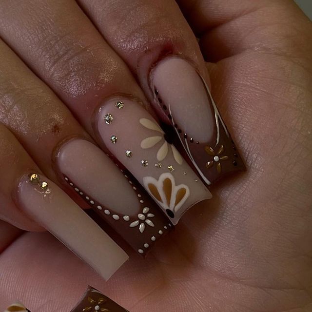 Sophisticated Floral Nail Art in Neutral and Brown Tones with Gold Accents