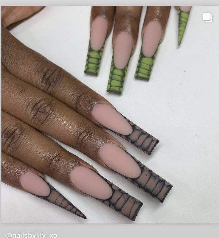 Dazzling Stiletto Nail Art: Reptilian Greens and Elegant Nudes Unite.