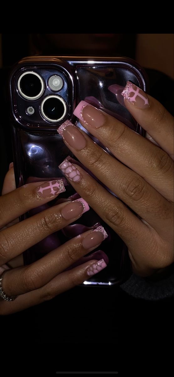 Stylish Square Nail Design in Nude and Pink with Glossy Finish and Shimmering Tips.