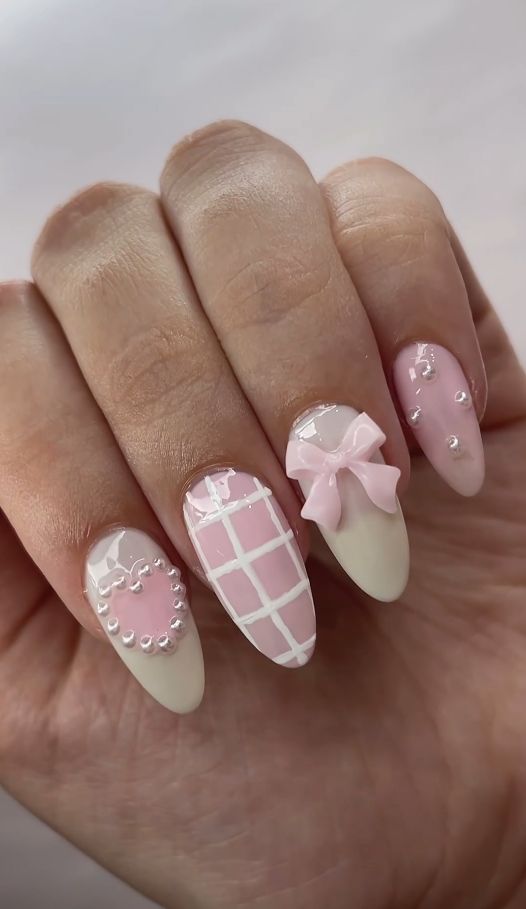 Whimsical Pastel Nail Design with Pearls and Bows