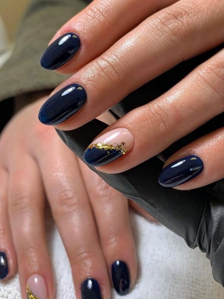 Chic Navy and Nude Nail Design with Gold Accents for a Sophisticated Look