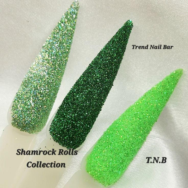 Bold Stiletto Nail Designs with Striking Gradient of Sparkling Greens