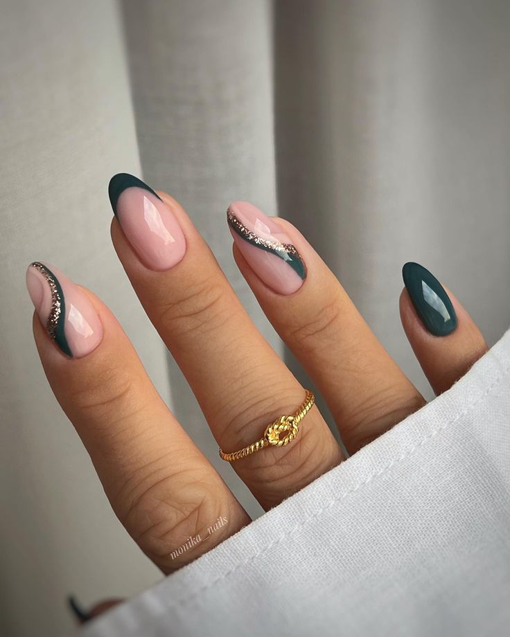 Sophisticated Almond-Shaped Nail Design in Deep Teal and Soft Pink with Sparkling Accents