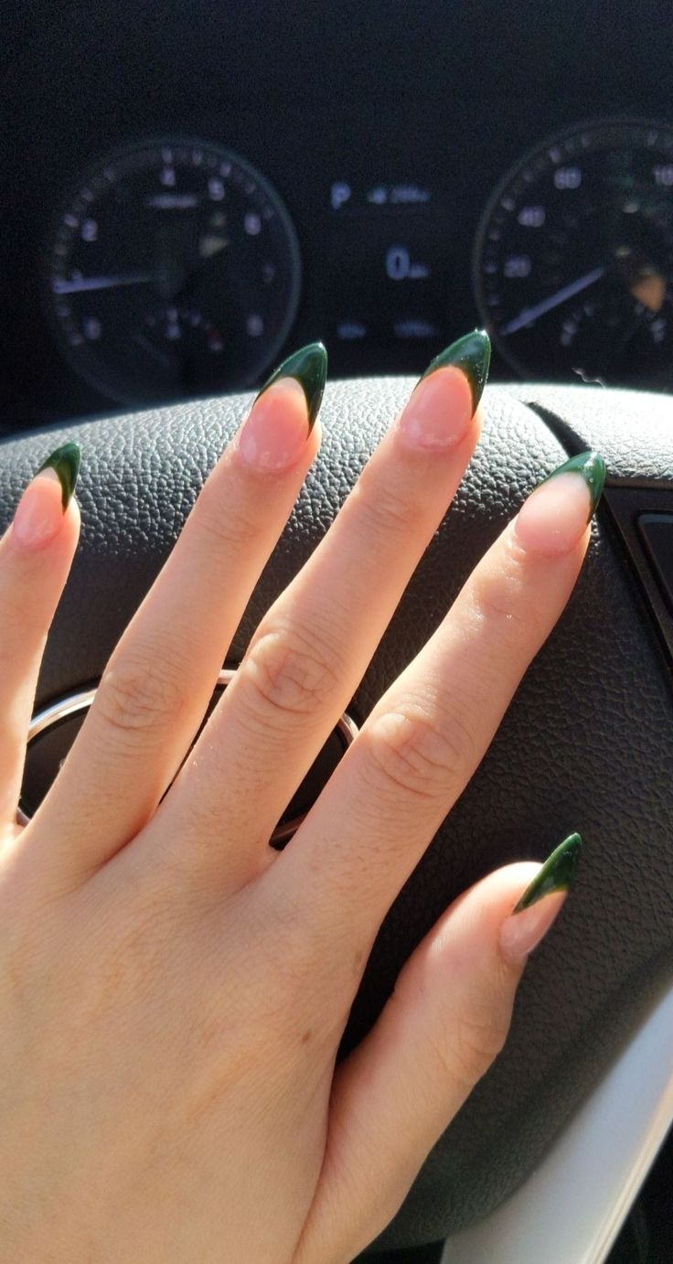 Chic Green Ombre Almond Nails: A Sophisticated Blend of Pale Pink and Deep Green.