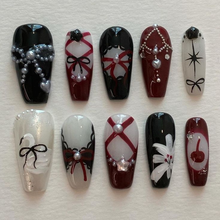 Sophisticated Black, White, and Deep Red Nail Designs for Glamorous Occasions.