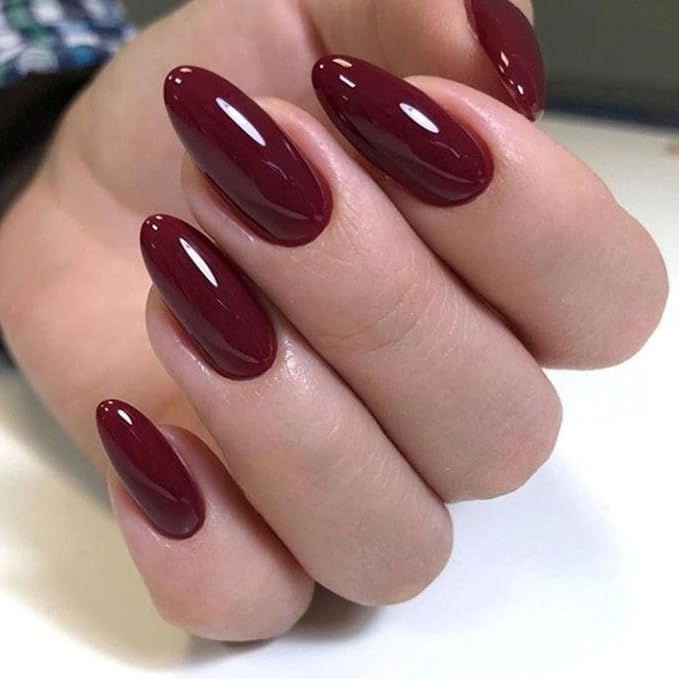 Sophisticated Deep Burgundy Almond-Shaped Nails for a Polished Look.