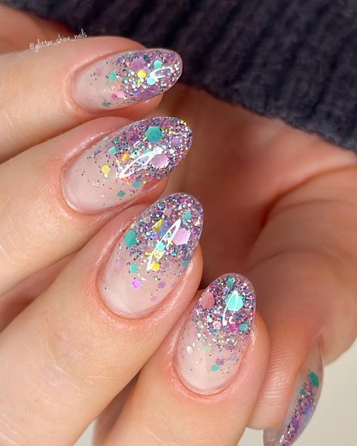 Festive Radiant Nail Design with Pastel Glitters and Playful Colors