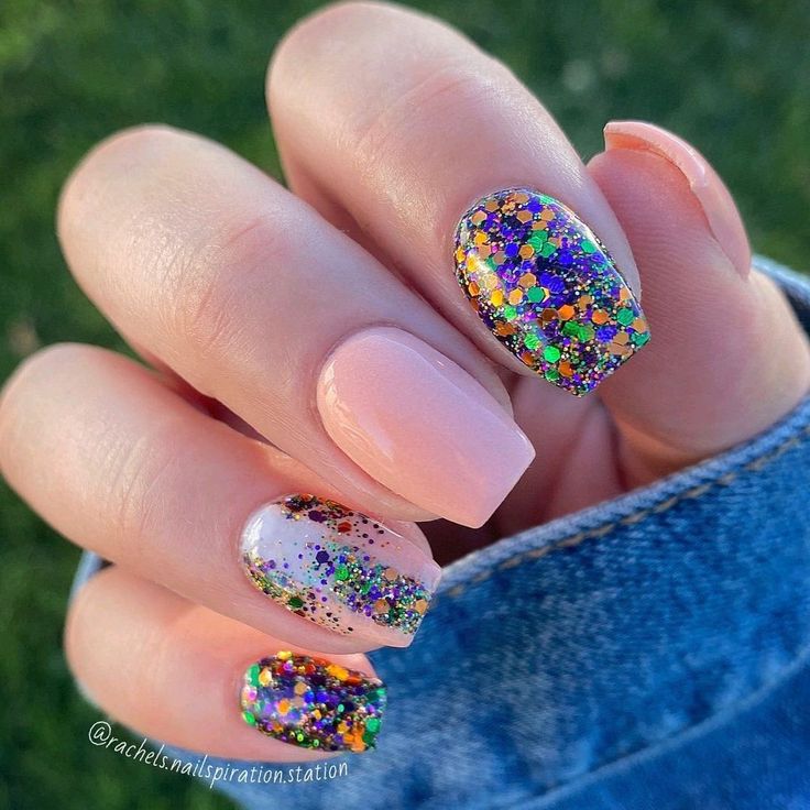 Vibrant Multicolored Glitter Nail Design with Elegant Nude Base