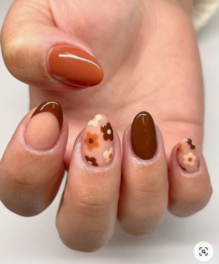 Sophisticated Nail Design Blending Warm Earthy Tones with Floral Patterns