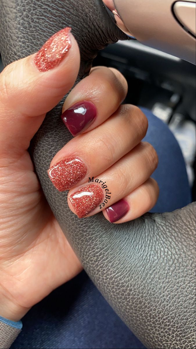 Glamorous Glittery Nail Design in Burgundy and Rose Gold for a Stunning Look