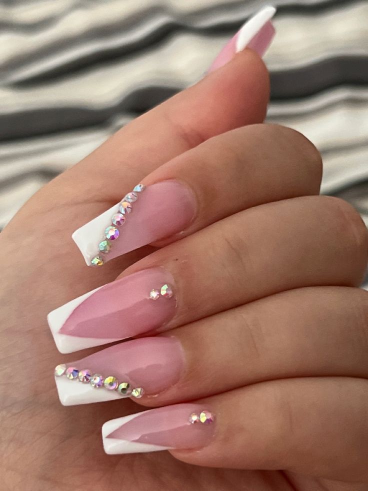 Chic Soft Pink French Tip Nails with Shimmering Rhinestone Accents