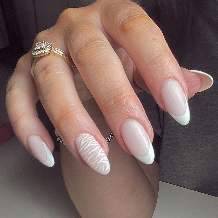 Sophisticated French Manicure: Elegant Pink Base with Intricate Detailing