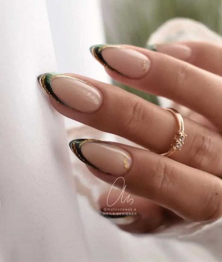 Sleek Almond-Shaped Nail Design with Dark Green and Gold Accents on a Nude Base