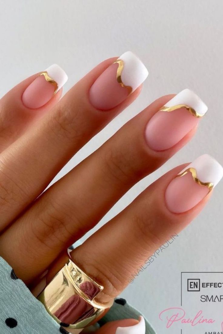 Sophisticated French Tip Nail Design with Gold Accents and Matte Base.