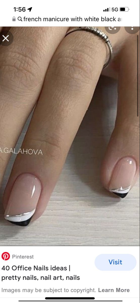 Elegant Modern Twist on Classic French Manicure with Black and White Accents.