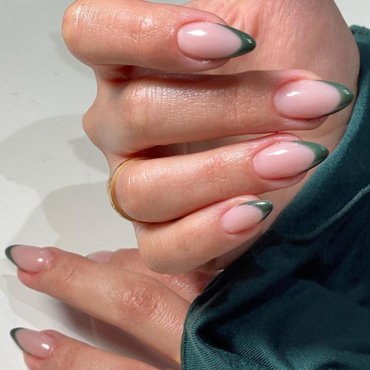 Chic Almond-Shaped Nails: Soft Pink Base with Bold Green Tips for a Modern, Timeless Look.