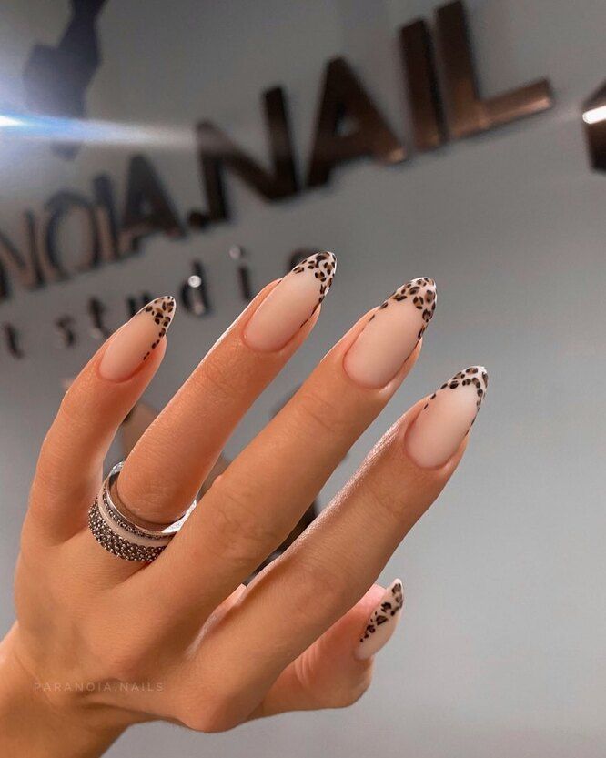 Chic Almond-Shaped Nails: Matte Nude and Animal Print Design