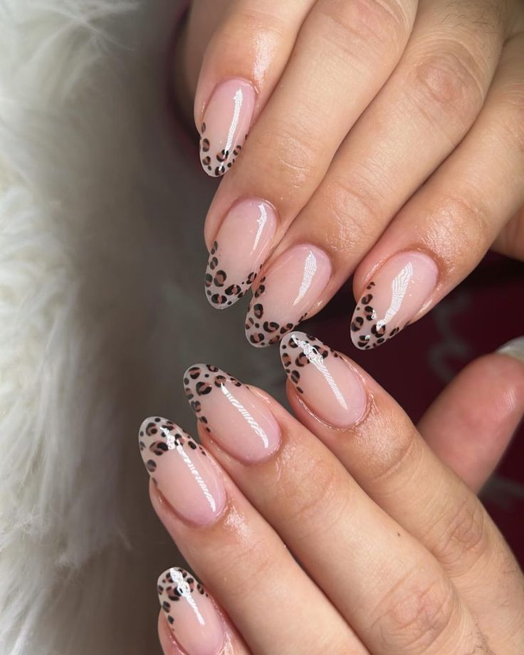 Chic Leopard Print Nails with Sleek Nude Base and Tapered Tips.