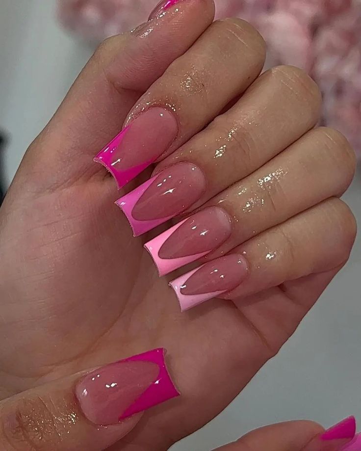 Playful Pink and Clear Nail Design with Striking Pointed Tips.